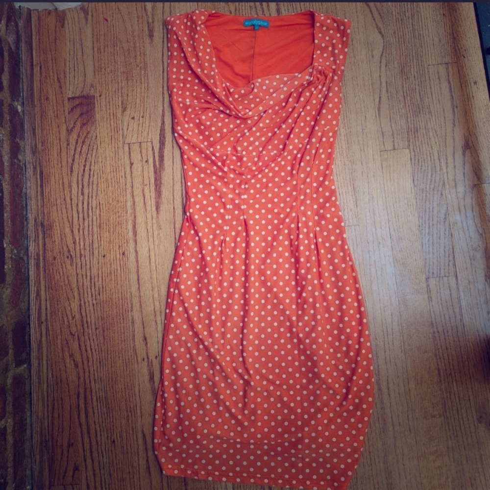 Vintage-inspired orange polka dot dress